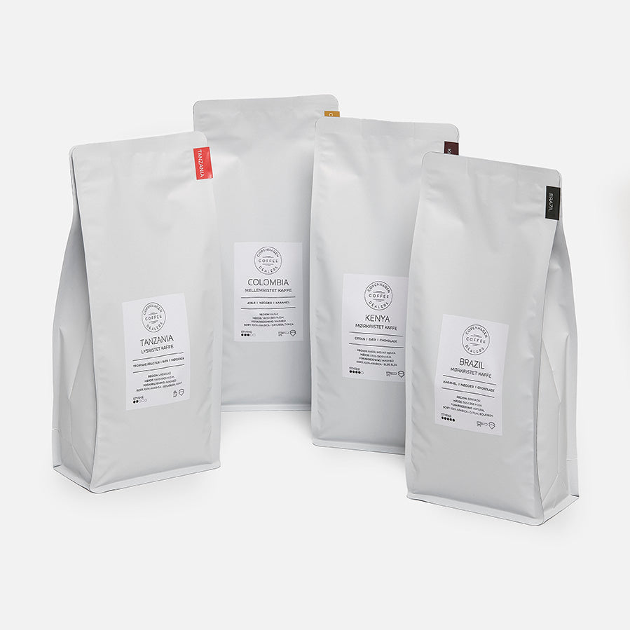 Dyk ind i vores 4x1000g kaffe smagspakke, som samler det bedste fra Colombia, Brasilien, Tanzania og Kenya, for en uovertruffen smagsrejse