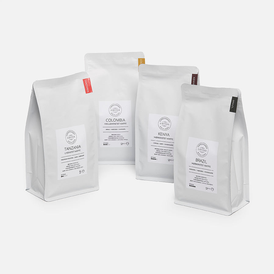 Vores 4x500g kaffe smagspakke fra Colombia, Brasilien, Tanzania og Kenya giver en rig og mangfoldig kaffeoplevelse, ideel for sande kaffeentusiaster