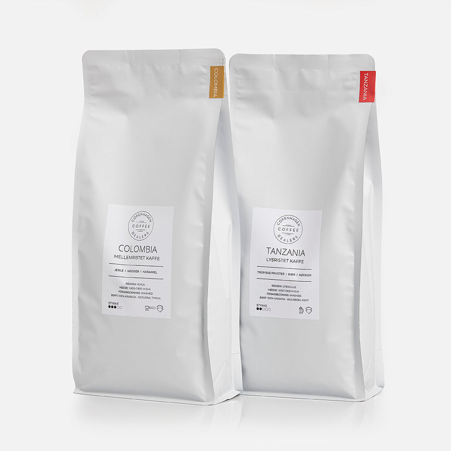 Vores eksklusive 2x1000g stempelkaffe smagspakke fra Colombia og Tanzania tilbyder en udsøgt smagsrejse for den ægte kaffeentusiast